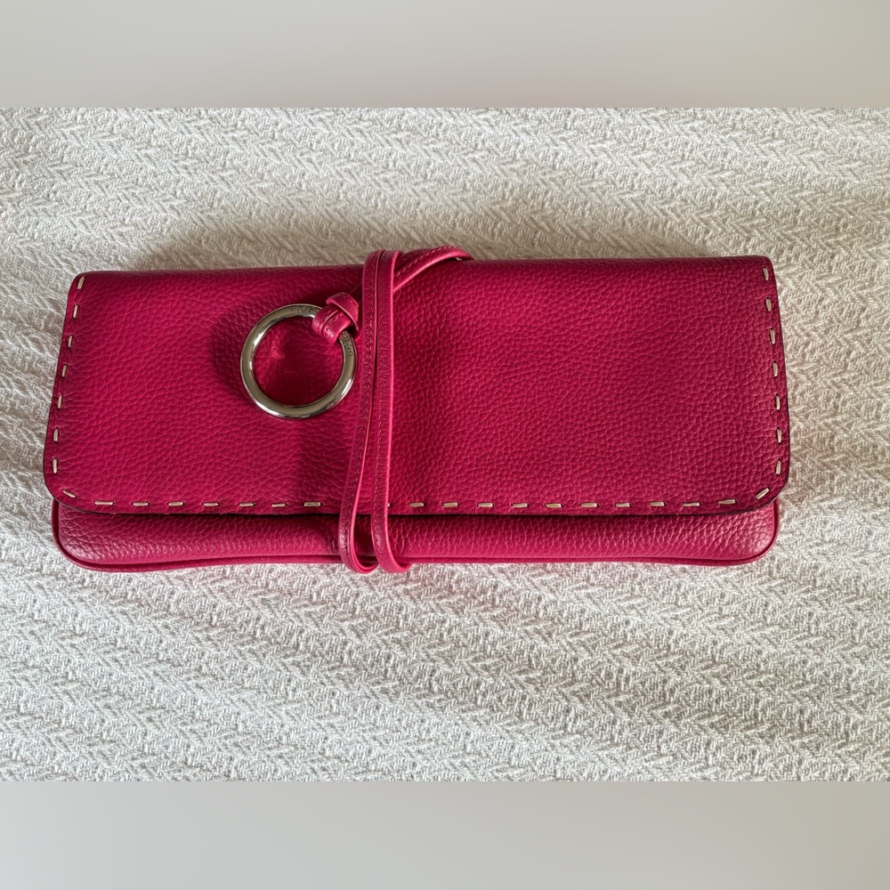 BCBGMaxAzria fuchsia pink pebbled leather clutch with ties